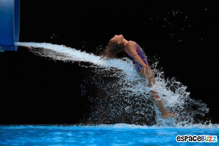 Illustration de l'article : Découvrez 10 clichés pris à la sortie d'un toboggan par la photographe Krista Long