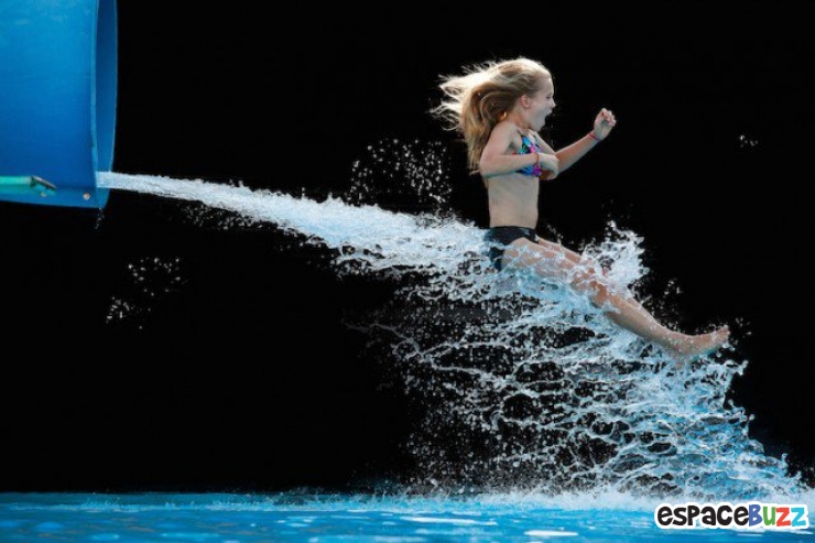 Illustration de l'article : Découvrez 10 clichés pris à la sortie d'un toboggan par la photographe Krista Long