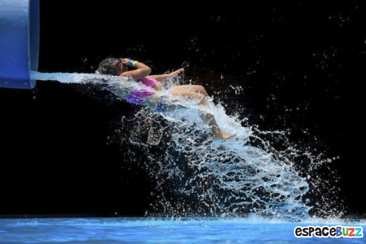 Illustration de l'article : Découvrez 10 clichés pris à la sortie d'un toboggan par la photographe Krista Long