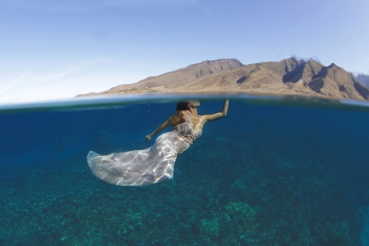 Illustration de l'article : Ne voulant pas de photos de mariage banales, ils immortalisent le moment sous l'eau !