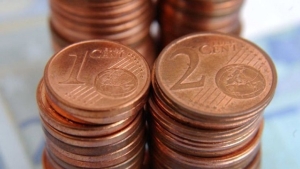 Illustration : "Ces pièces de 1 et 2 centimes peuvent valoir pas mal d’argent ! Si vous en avez à la maison, regardez ceci:"